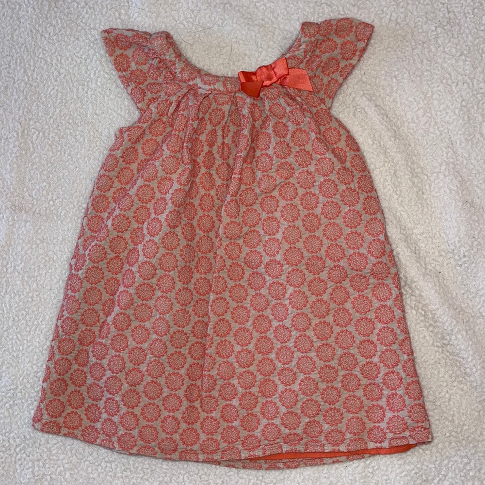 Cherokee Dress 3T Orange (Pink Coral) raised design on beige background